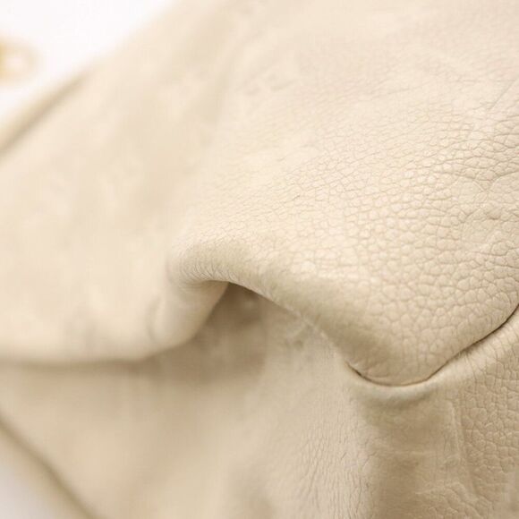 Gorgeous Louis Vuitton Artsy MM Monogram Empreinte Leather Tote in Ivory - Picture 9 of 10